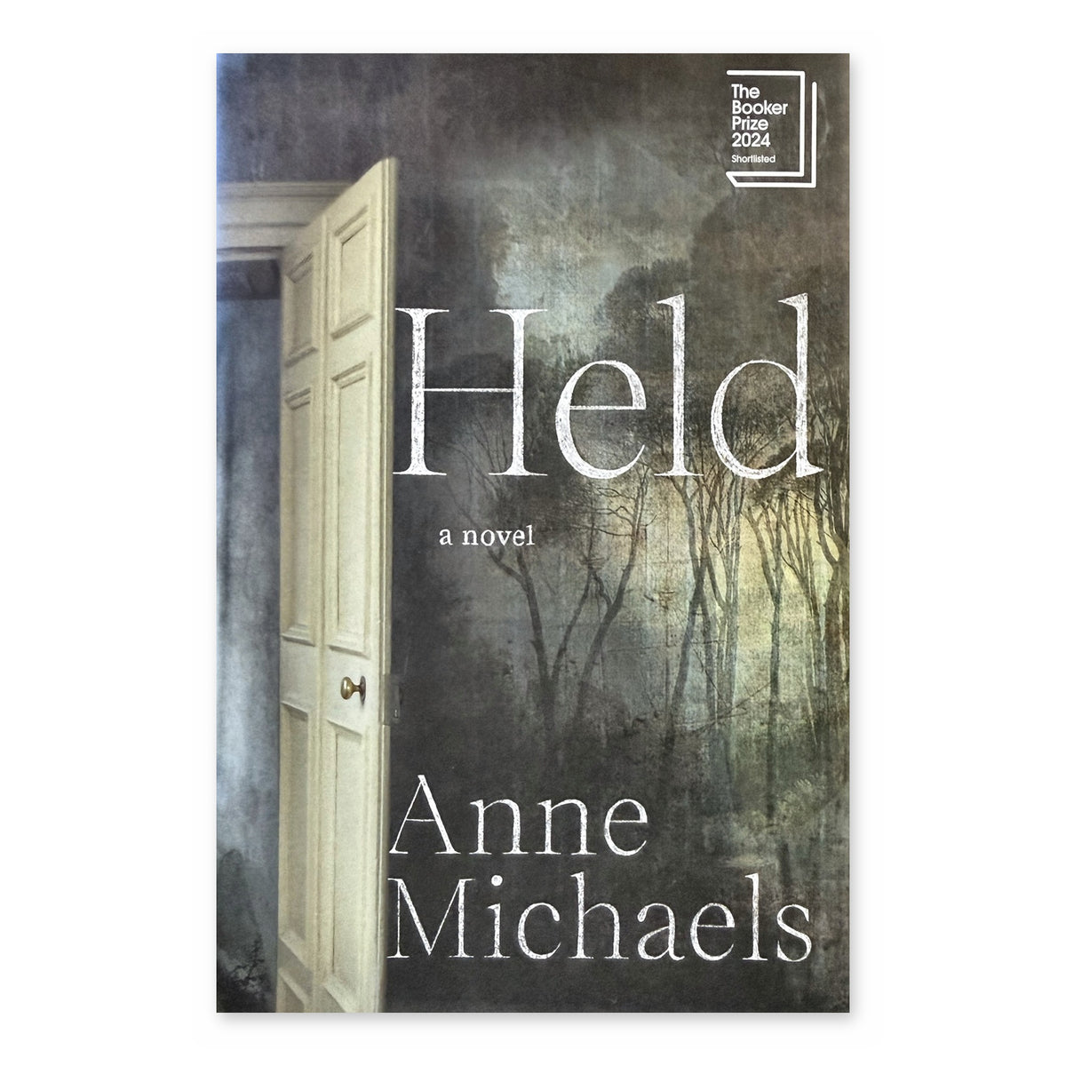 Held by Anne Michaels, hardcover, front cover